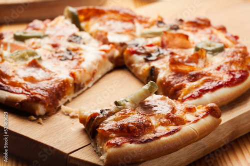 Pizza with cheese, ham and mushroom