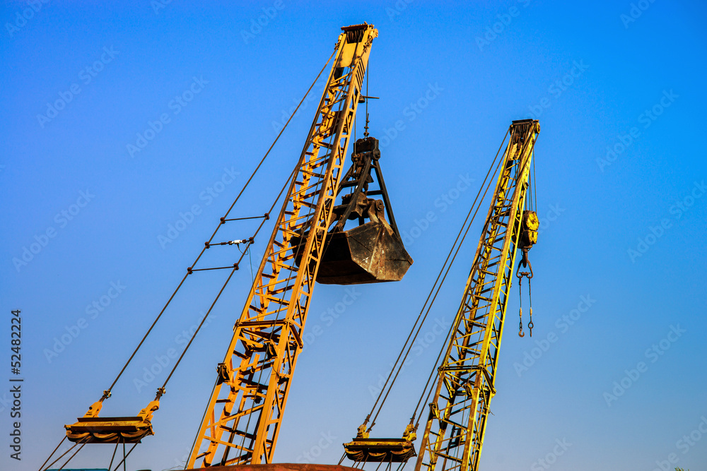 Old rusty buckets on sky background Old rusty buckets on sky background