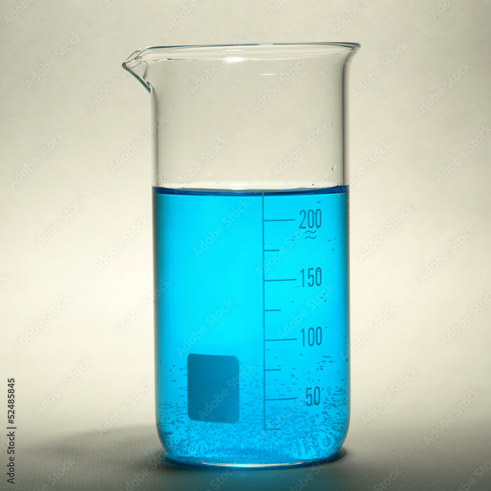 test-tube with blue liquid on grey background test-tube with blue liquid on grey background