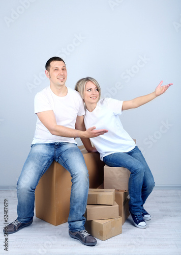 Young couple moving in new house