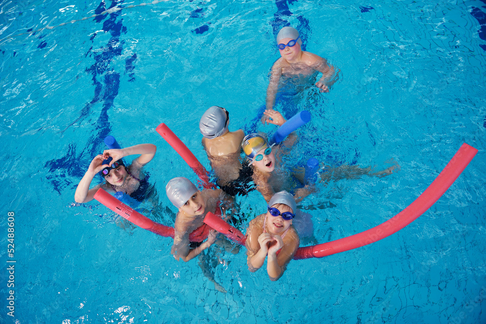 happy children group  at swimming pool