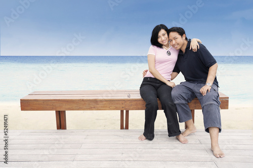 Romantic couple at beach © Creativa Images