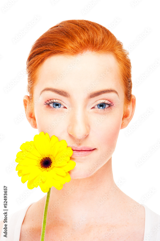 Woman with yellow flower near her face on white background Woman with yellow flower near her face on white background