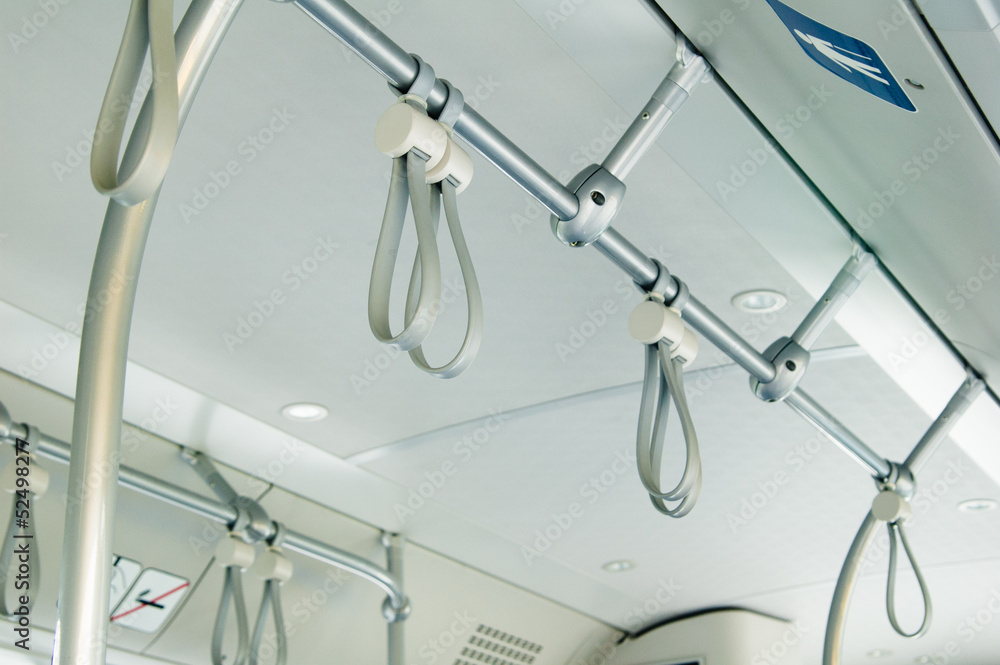 Handrails in the modern city bus, close-up Handrails in the modern city bus, close-up