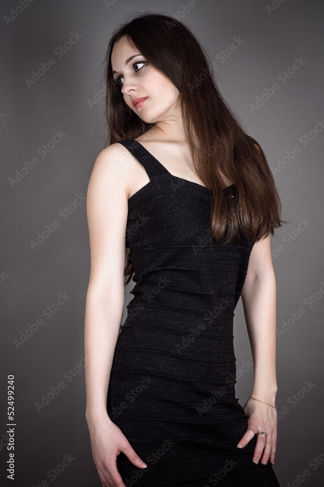 beautiful brunette in a black dress beautiful brunette in a black dress