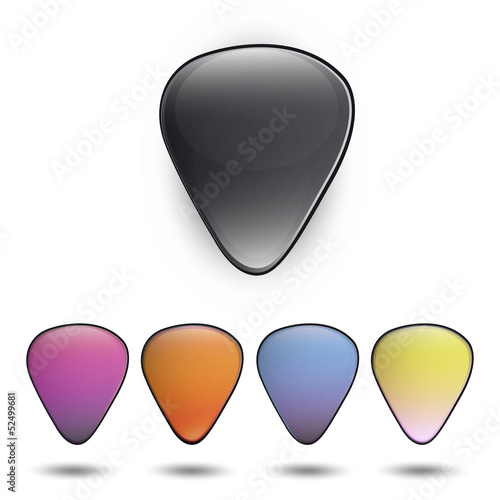 Colorful plectrums on white background.