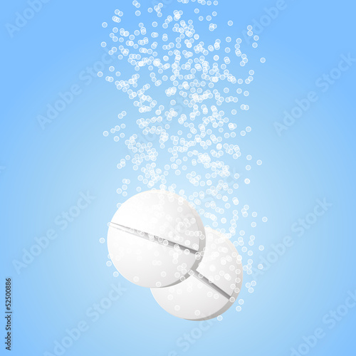 effervescent tablets with bubbles in blue water