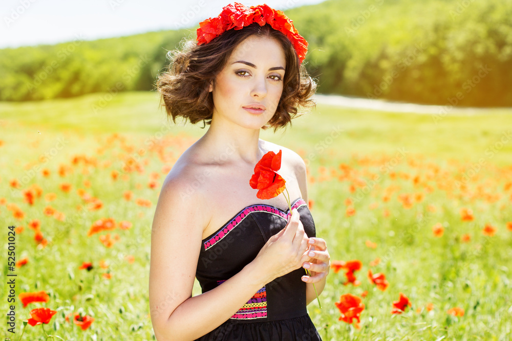 Young girl in poppies field Young girl in poppies field