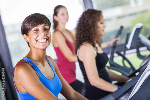 People Running on Treadmill in the Gym