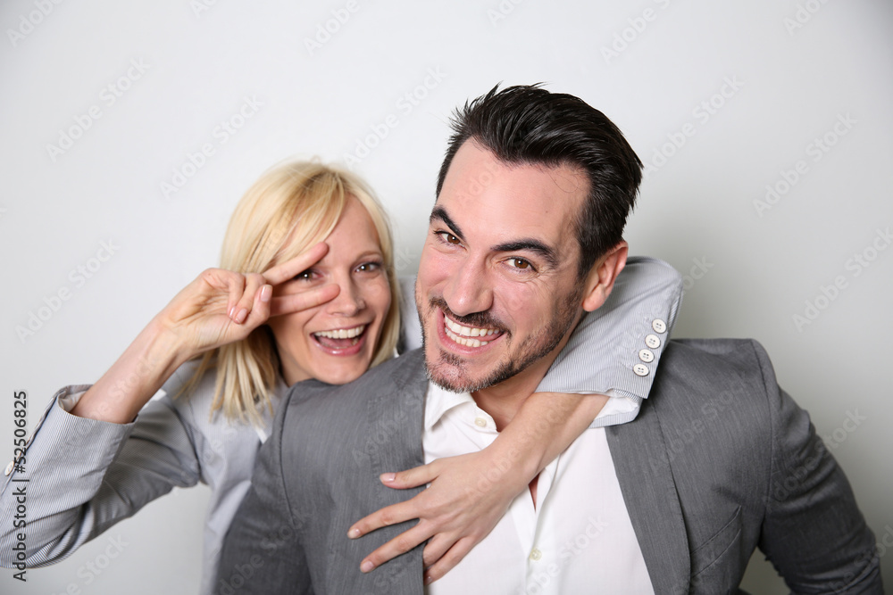 Cheerful trendy couple having fun Cheerful trendy couple having fun