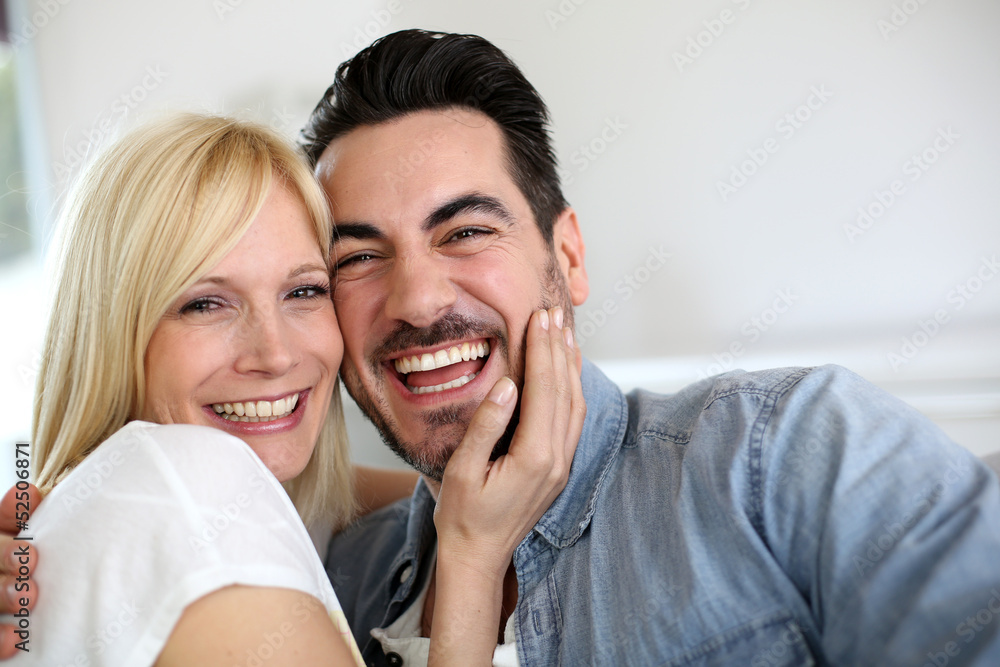 Cheerful couple having fun together Cheerful couple having fun together