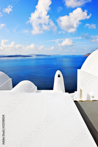 Typical architecture with stunning view over the caldera in Oia