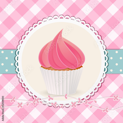 cupcake with pink icing on pink gingham background