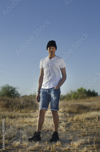 Male model posing in desert © BCFC