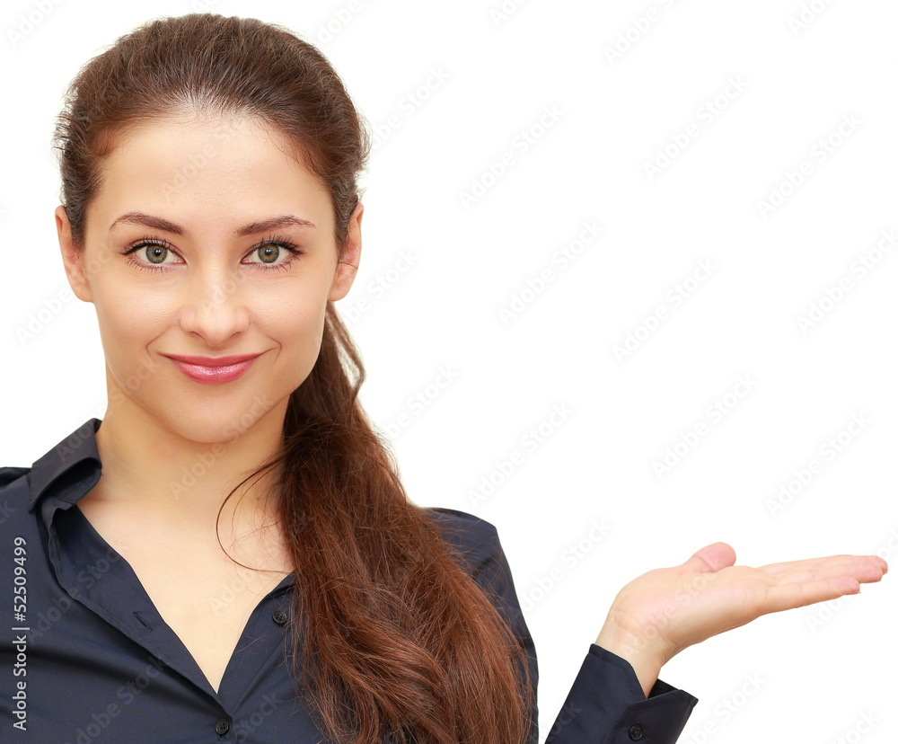 Smiling business woman showing product holding in hand isolated Smiling business woman showing product holding in hand isolated