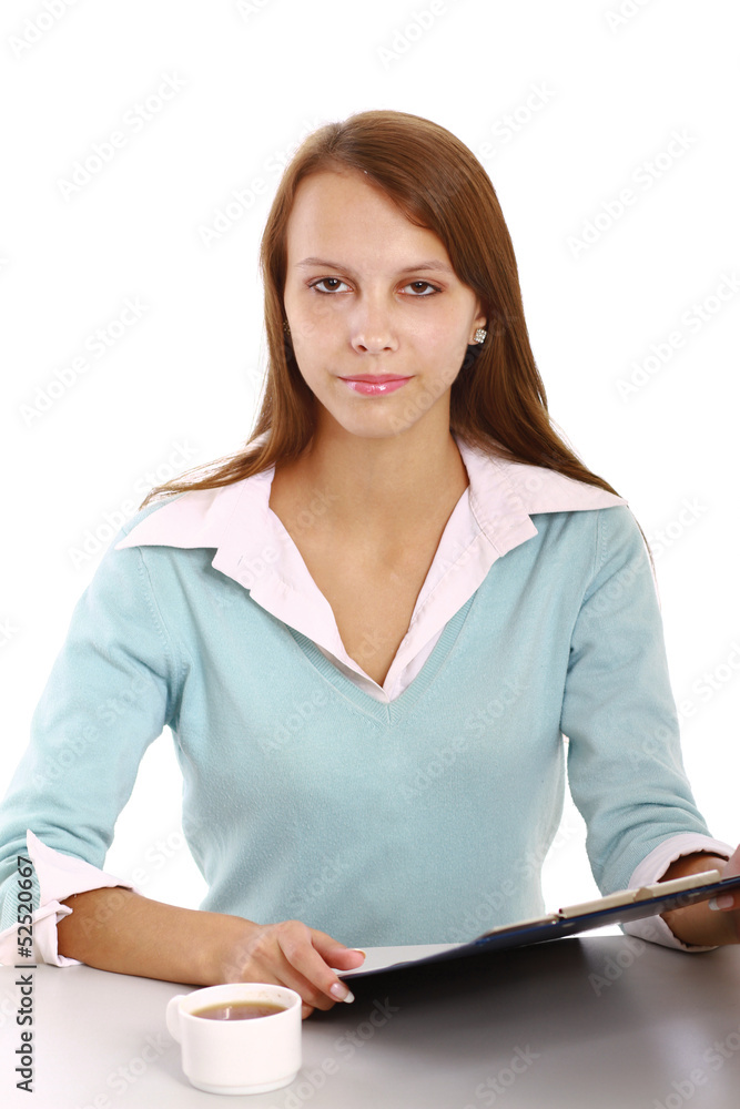 Young woman working with documents at desk isolated Young woman working with documents at desk isolated
