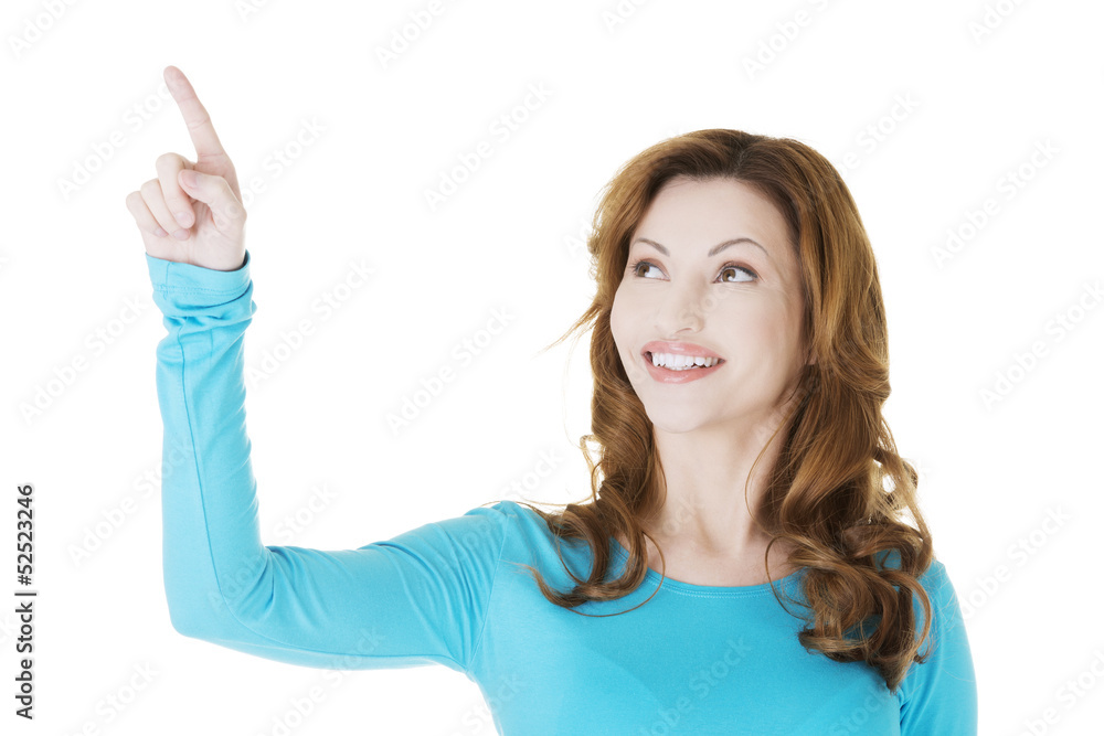 Beautiful woman making choose on abstract screen Beautiful woman making choose on abstract screen