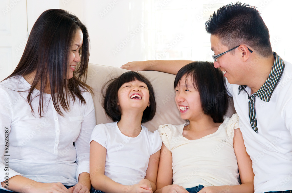 Asian family having pleasant conversation at home Asian family having pleasant conversation at home