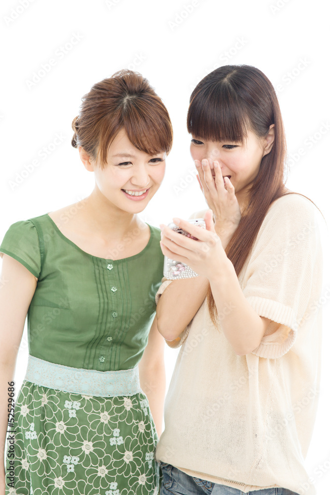Beautiful young women using a cellular Beautiful young women using a cellular