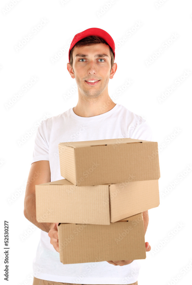 Young delivery man holding parcels, isolated on white Young delivery man holding parcels, isolated on white