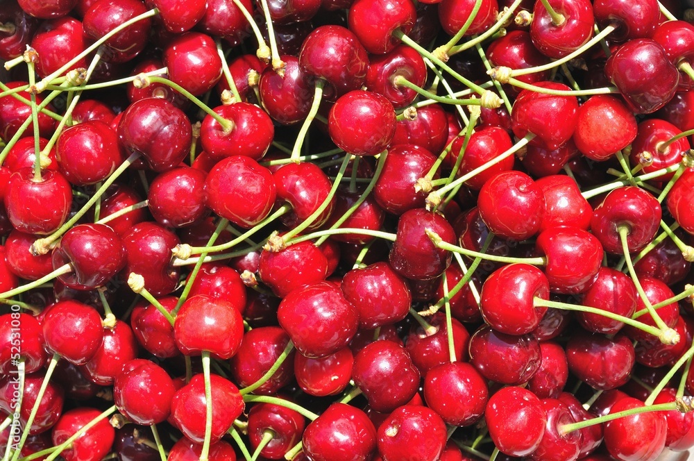 Texture from group of red ripe cherries Texture from group of red ripe cherries