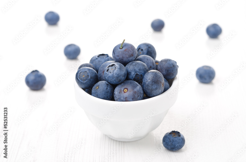 Fresh blueberries in a white bowl Fresh blueberries in a white bowl
