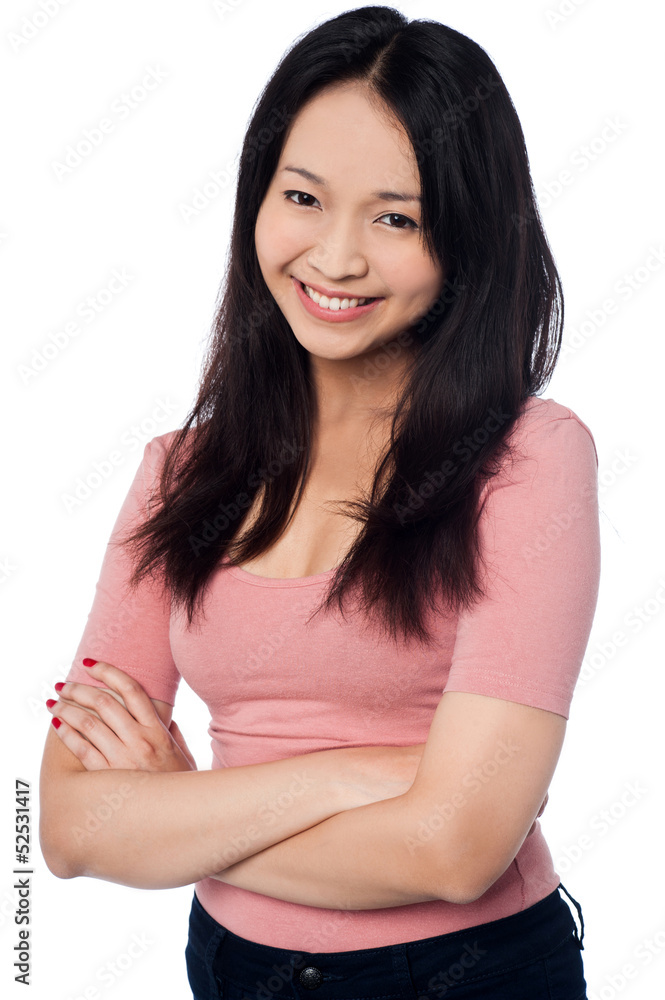 Pretty asian girl posing casually, arms folded Pretty asian girl posing casually, arms folded