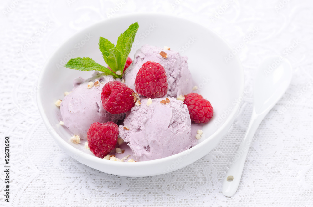 ice cream with raspberries in white bowl ice cream with raspberries in white bowl