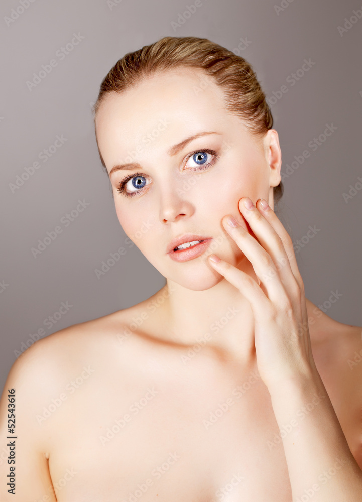 Portrait of a beautiful female model on white background Portrait of a beautiful female model on white background