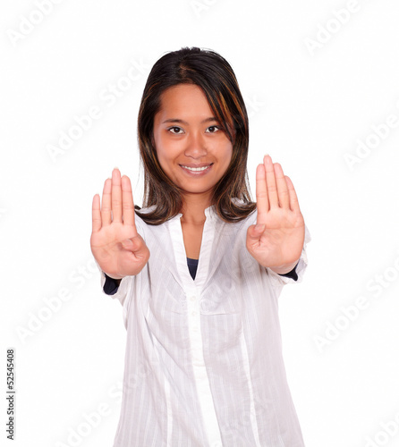 Smiling asiatic young woman giving the high