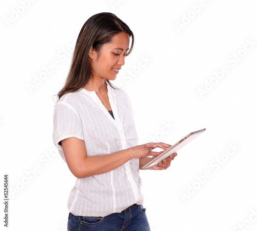 Asiatic young woman working on tablet pc