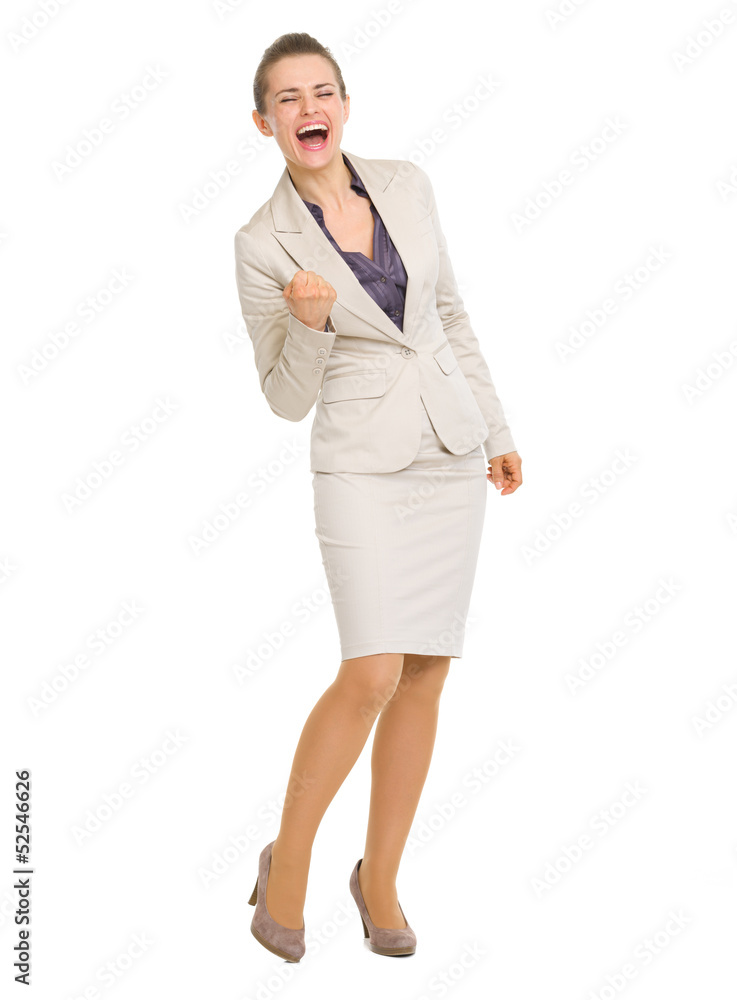 Full length portrait of business woman fist pump Full length portrait of business woman fist pump