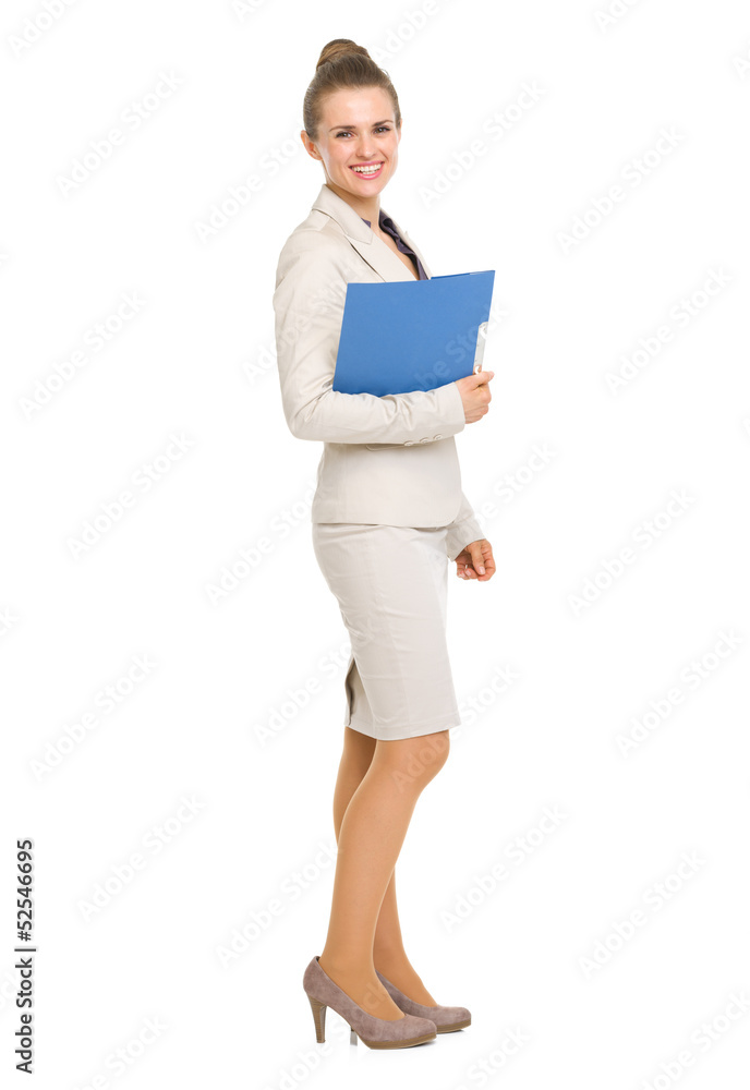 Full length portrait of smiling business woman with folder Full length portrait of smiling business woman with folder