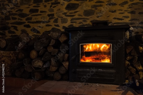 Firewood near fireplace