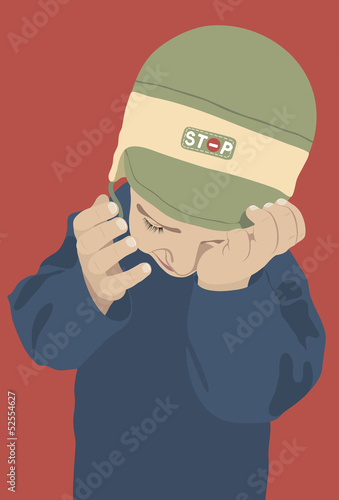 crying boy on a red background