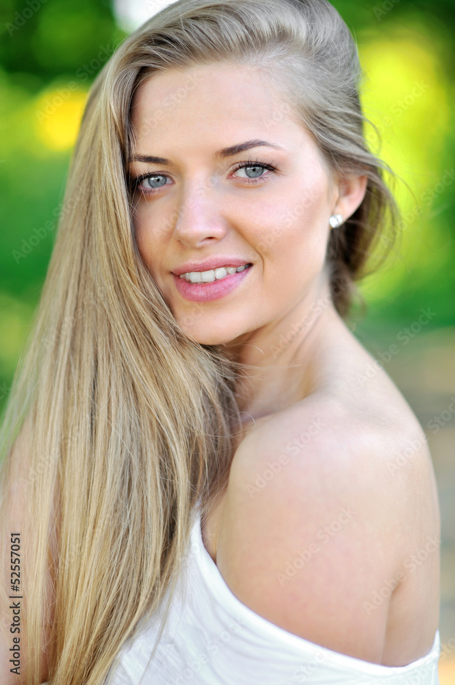 Beautiful girl face smiling - outdoor portrait Beautiful girl face smiling - outdoor portrait