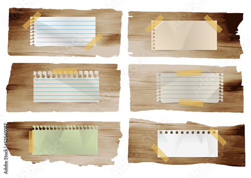 Fototapeta Naklejka Na Ścianę i Meble -  Collection of various note papers stick on wood planks