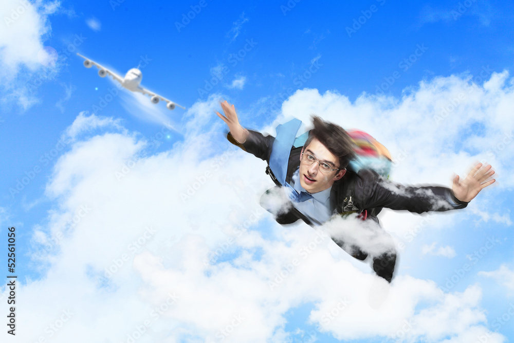 Young businessman flying with parachute on back Young businessman flying with parachute on back
