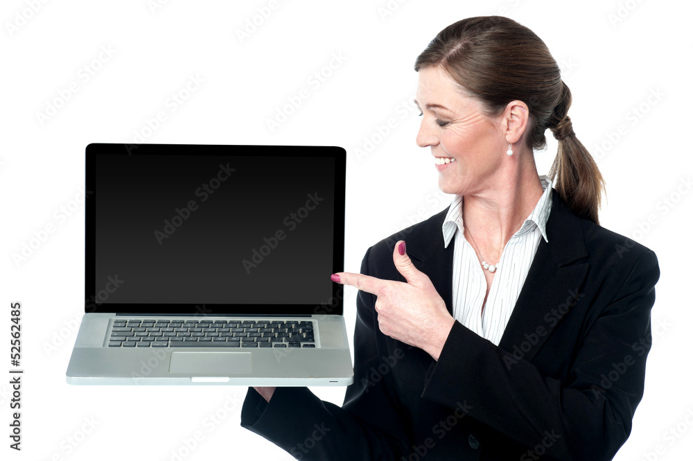 Female sales executive presenting new laptop Female sales executive presenting new laptop