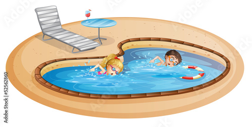 A girl and a boy swimming at the pool