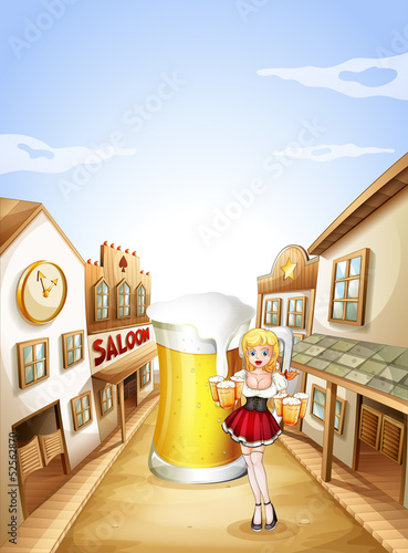 A girl holding a beer in front of a big glass of beer