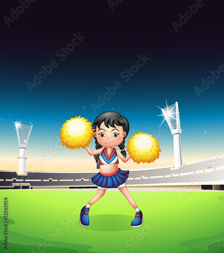 A young woman dancing at the soccer field
