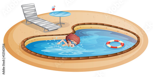 A young gentleman practicing at the pool