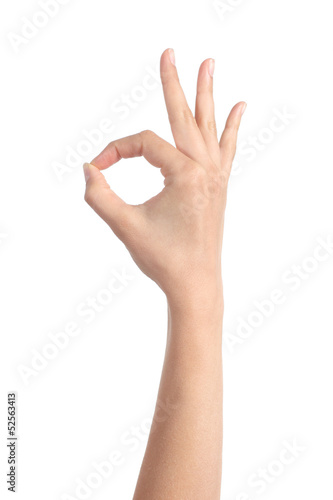 Woman hand making ok gesture photo