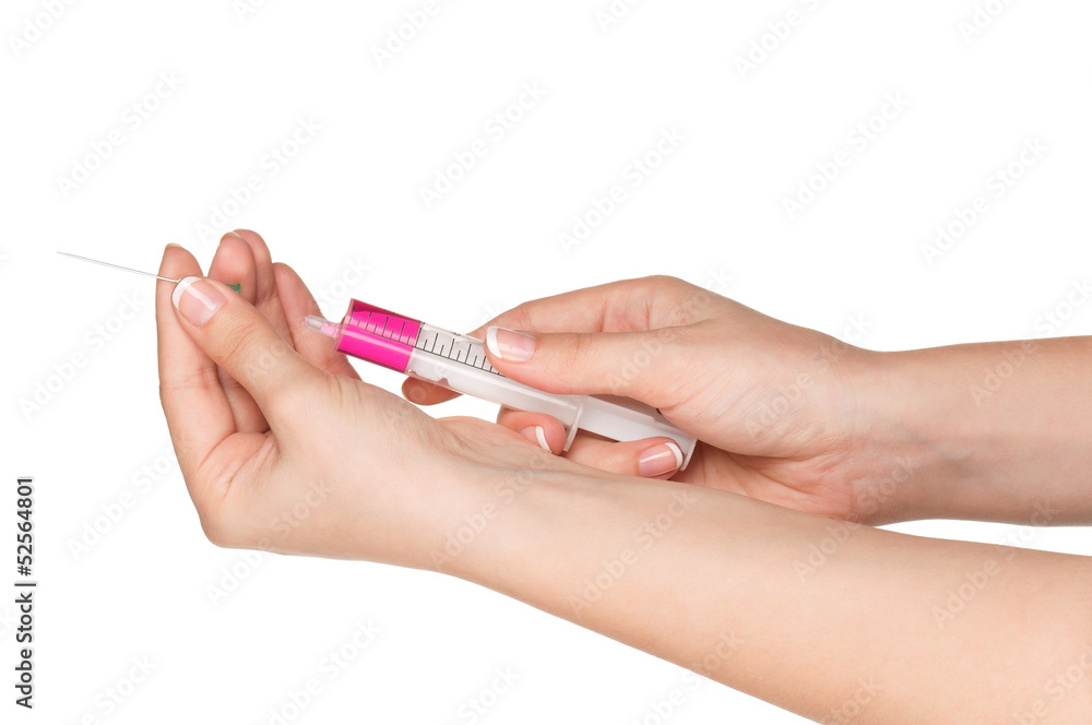 Hand with syringe Hand with syringe