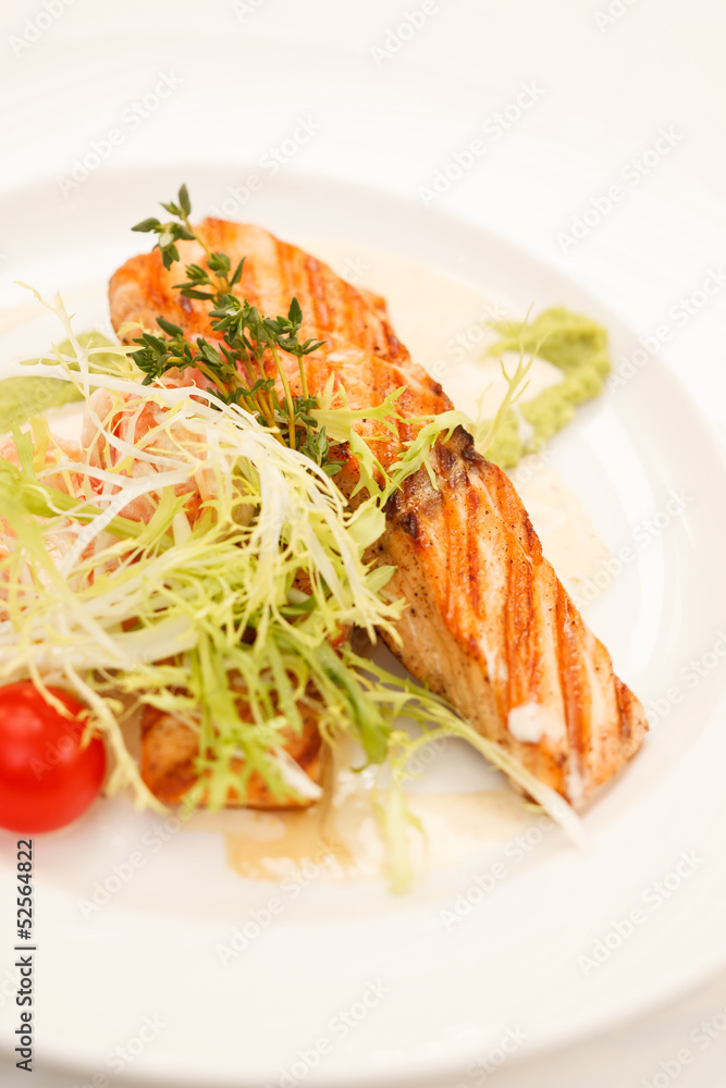 Grilled salmon steak with salad Grilled salmon steak with salad