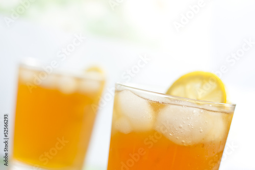 Glass of ice tea with lemon