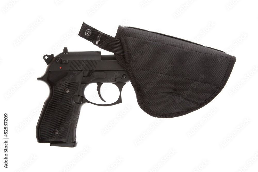 9mm Pistol in a flexible holster 9mm Pistol in a flexible holster