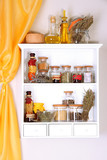Variety spices on kitchen shelves