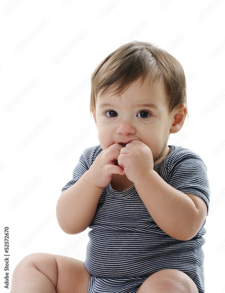 Baby is sitting on floor, isolated on white Baby is sitting on floor, isolated on white